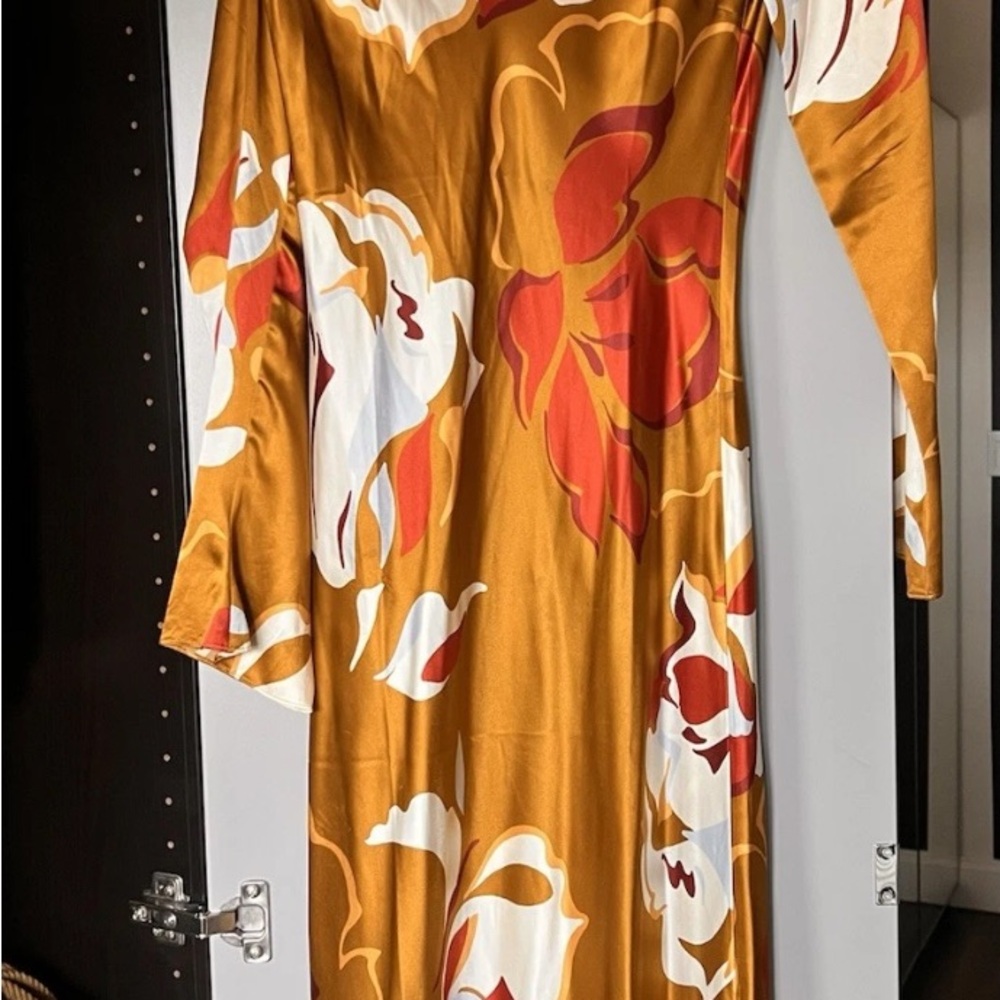 Reformation Long sleeve maxi dress. Open back. Pre owned. Size small.